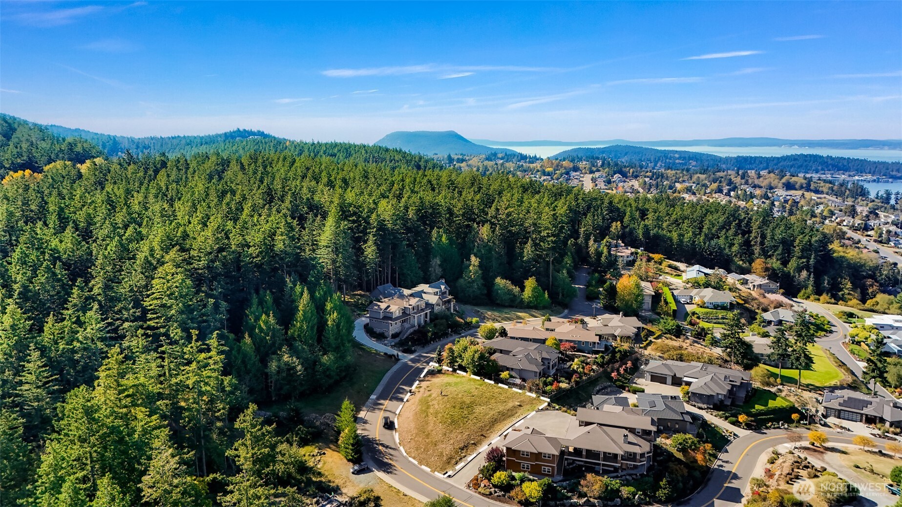 2904 17th Street Anacortes, WA 98221 - Photo 3 of 15 a view of a lake with a mountain in the background