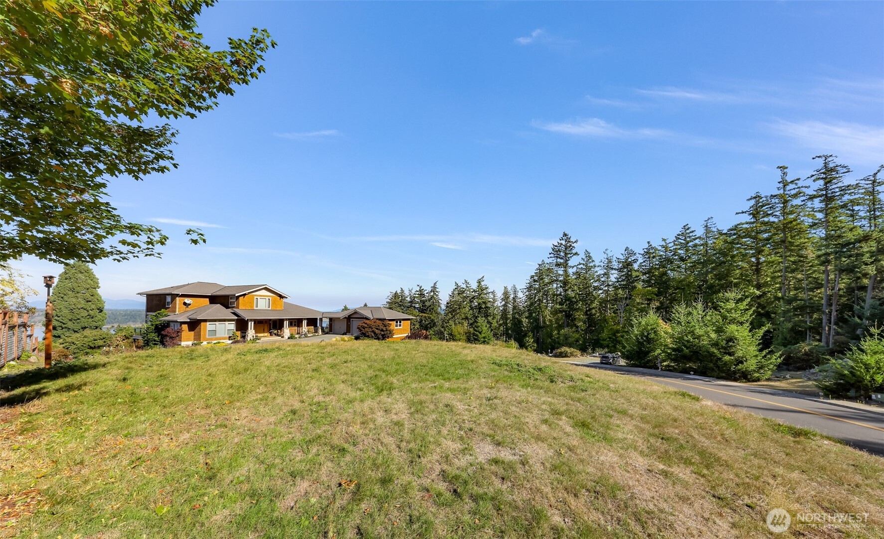 2904 17th Street Anacortes, WA 98221 - Photo 6 of 15 a view of yard with swimming pool and trees