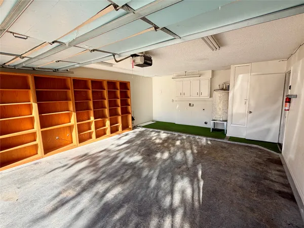 a view of empty room with windows