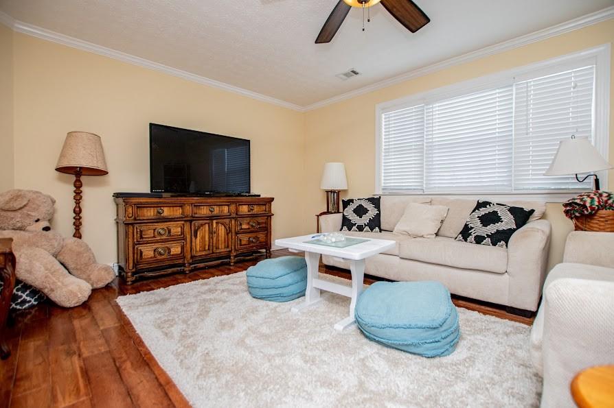 575 Liberty Church Road Carrollton, GA 30116 - Photo 42 of 95 a living room with furniture and a flat screen tv