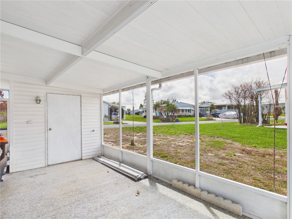 6135 98th Lane Sebastian, FL 32958 - Photo 3 of 18 a view of a room with porch and yard