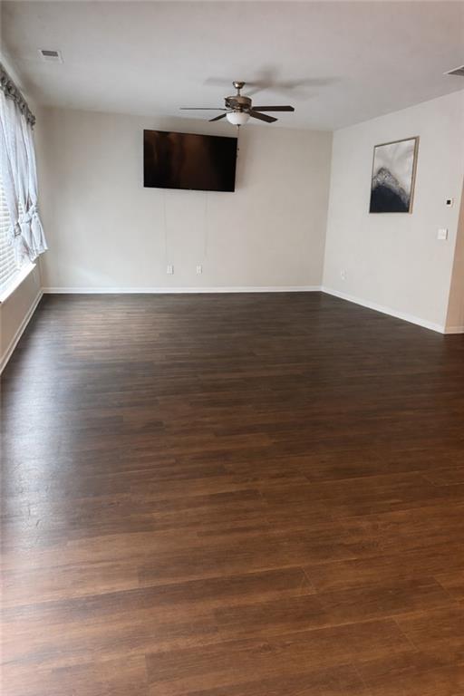 270 Wellbrook Drive Covington, GA 30016 - Photo 3 of 11 a view of a room with wooden floor