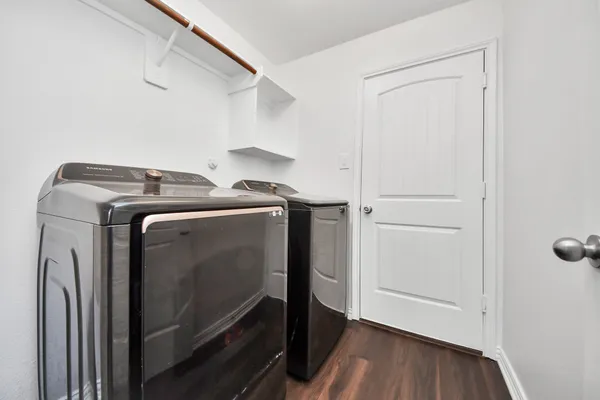 a utility room with dryer and washer