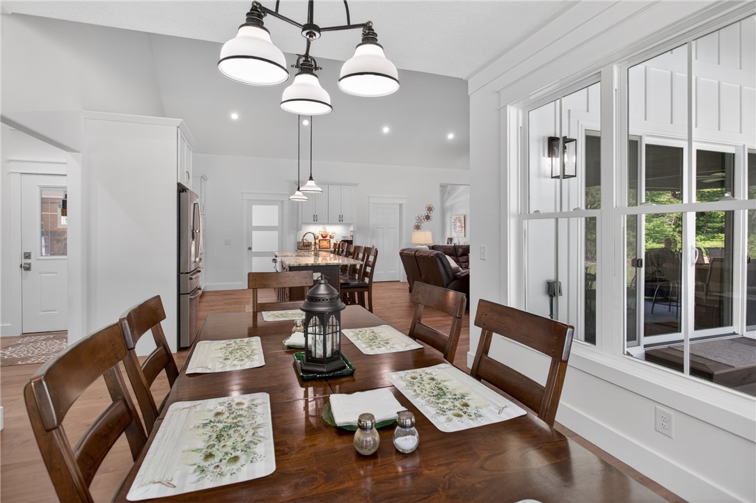 921 Falling Waters Lane Seneca, SC 29672 - Photo 19 of 46 An open-concept living area provides ample space for entertaining and everyday comfort.