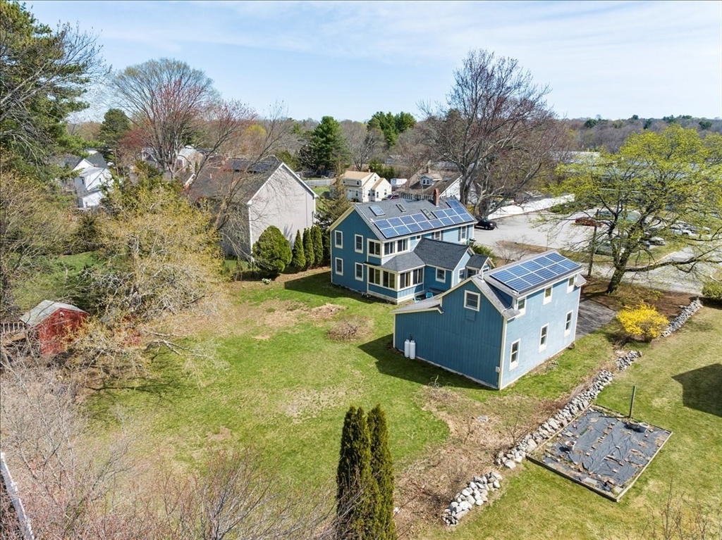 10 2nd Street Natick, MA 01760 - Photo 2 of 31 a view of a house with a yard and mountain