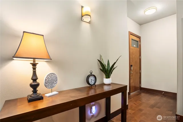 a view of entryway with wooden floor