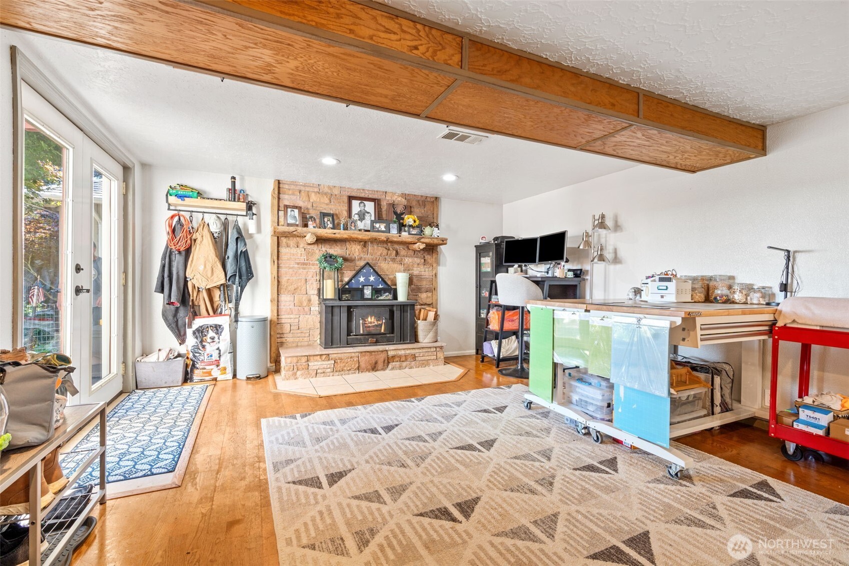 719 Peters Street Raymond, WA 98577 - Photo 17 of 36 a bed room with a bed and a large window