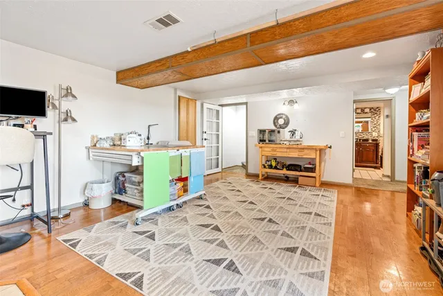 a bedroom with a bed and furniture