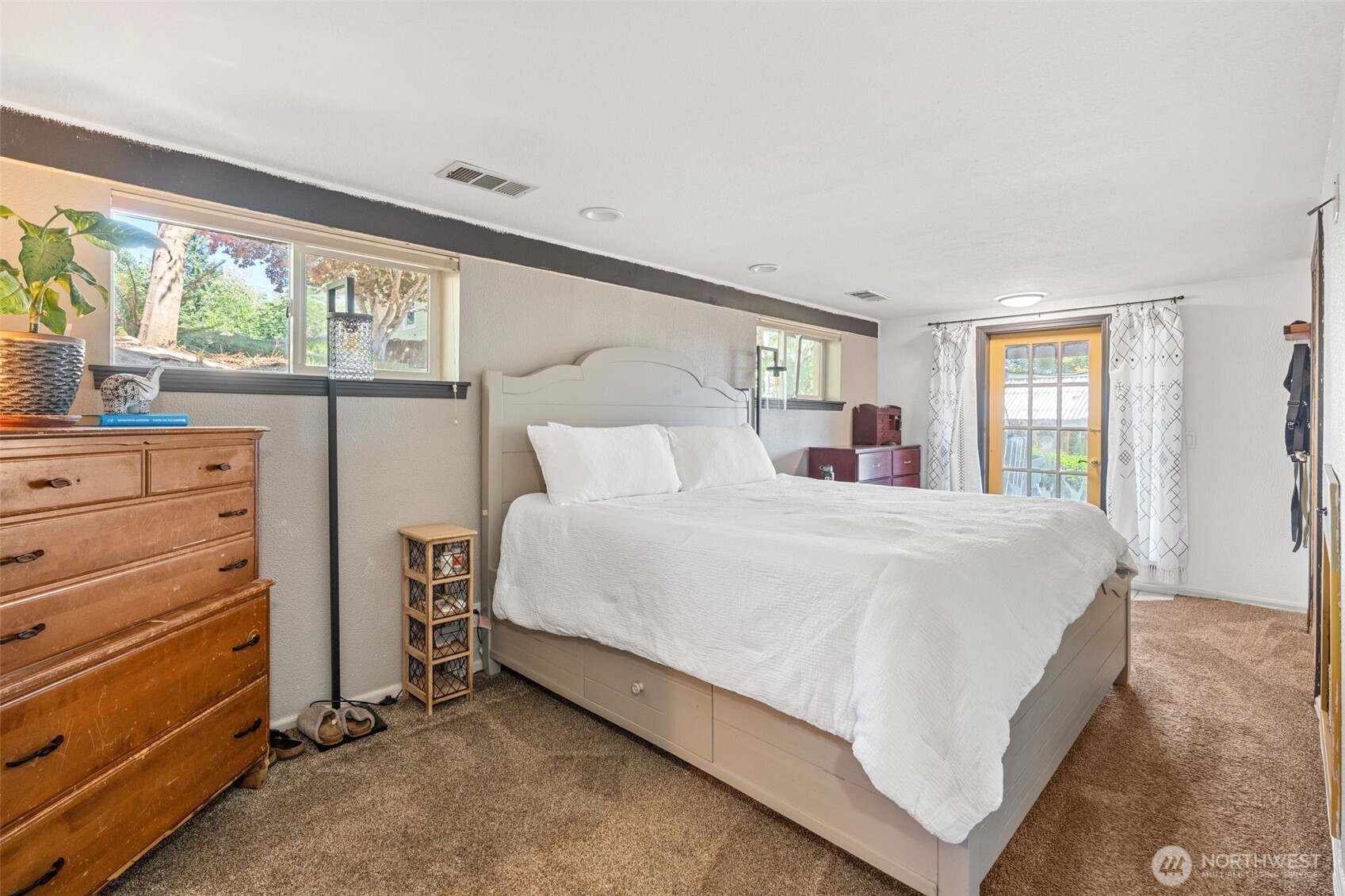 719 Peters Street Raymond, WA 98577 - Photo 19 of 36 a bedroom with a bed and a window