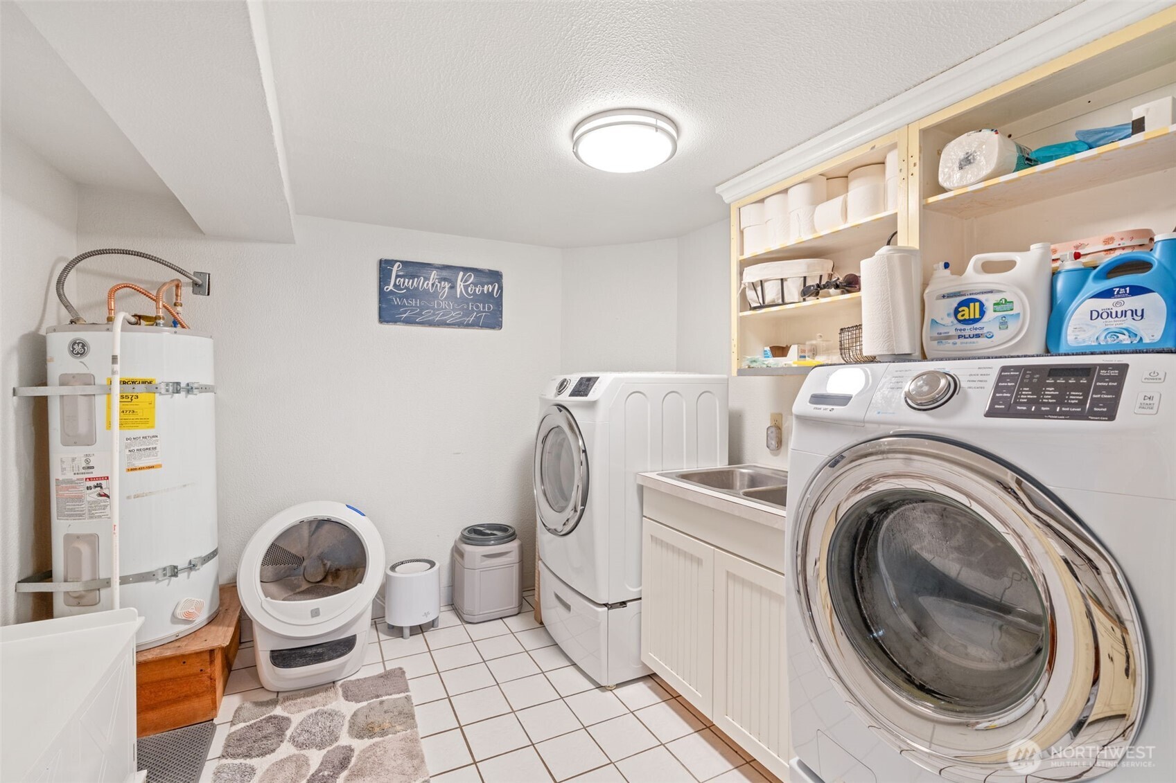 719 Peters Street Raymond, WA 98577 - Photo 22 of 36 a utility room with dryer and washer
