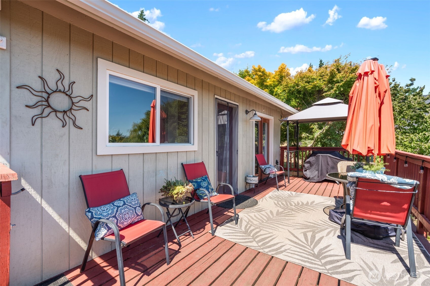 719 Peters Street Raymond, WA 98577 - Photo 29 of 36 a outdoor space with patio the couches and a potted plant with table and chairs