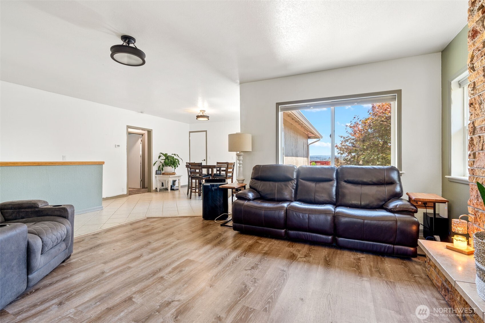 719 Peters Street Raymond, WA 98577 - Photo 5 of 36 a living room with furniture and a window