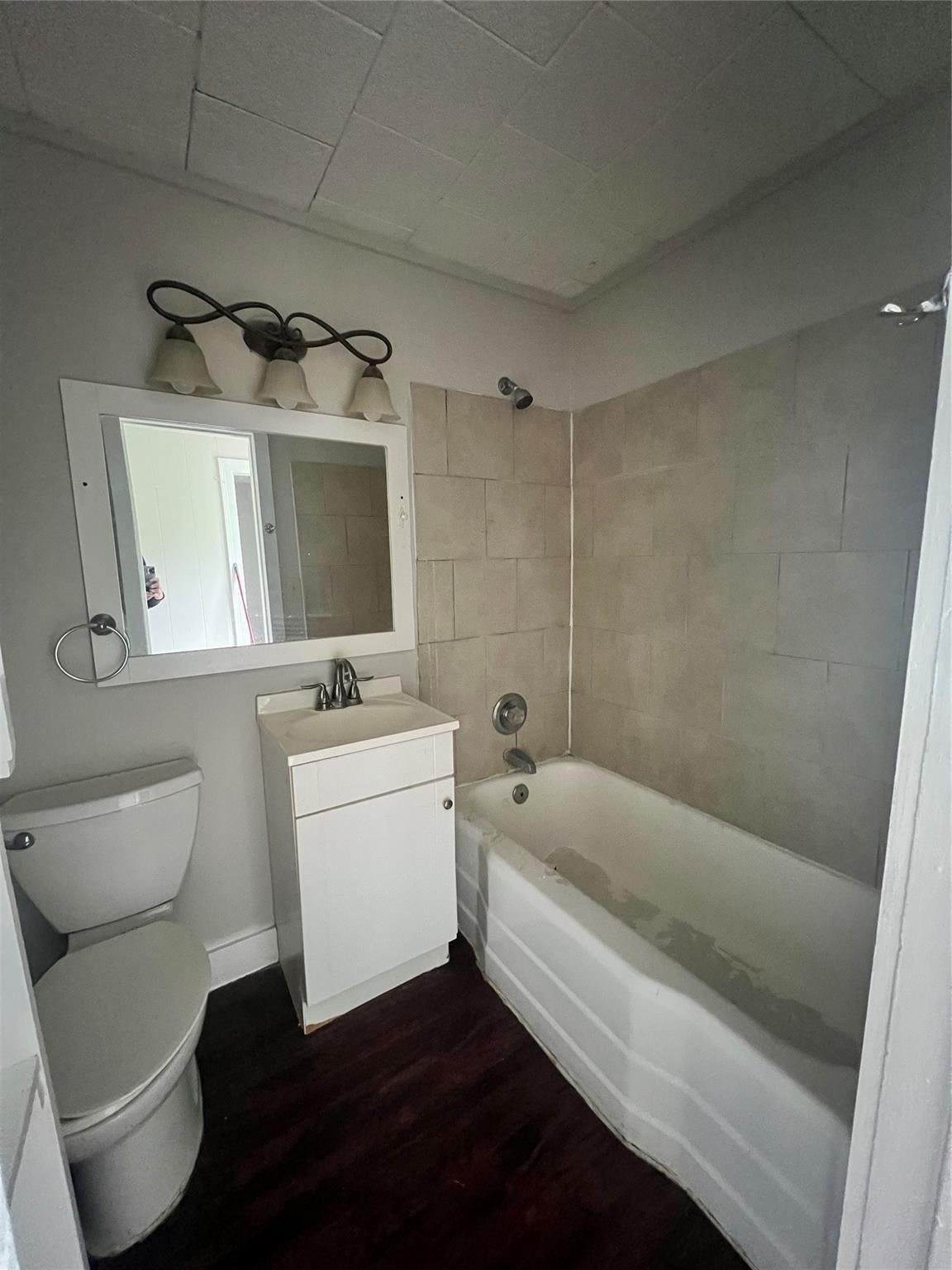 312 South Pumphrey Street Edna, TX 77957 - Photo 7 of 12 a bathroom with a sink a toilet and shower