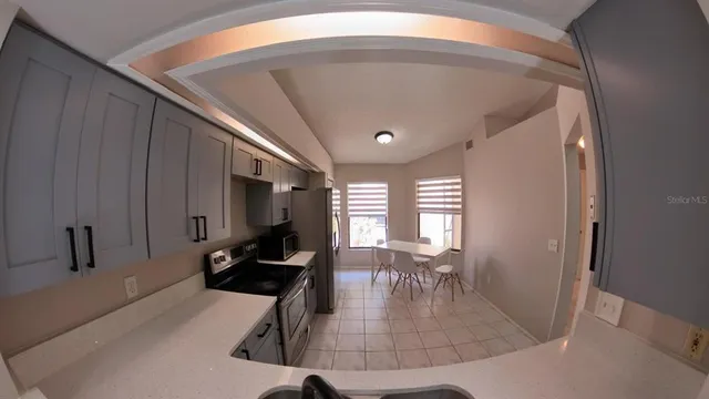 a view of a living room and dining room