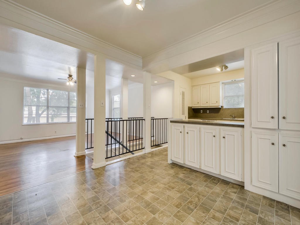 2819 San Gabriel Street, Unit B Austin, TX 78705 - Photo 9 of 20 a view of a kitchen with white cabinets