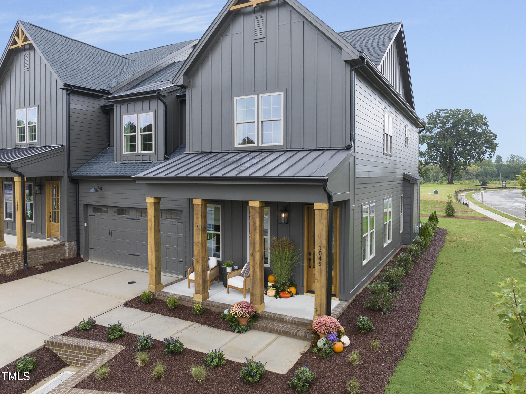 1001 Coldspring Circle Durham, NC 27705 - Photo 15 of 49 a front view of a house with garden