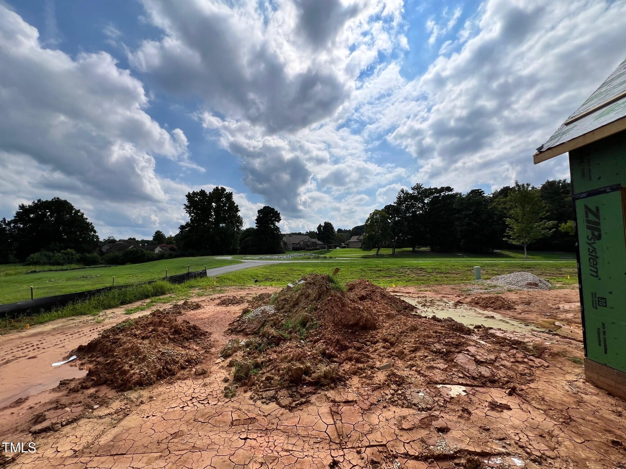 1001 Coldspring Circle Durham, NC 27705 - Photo 3 of 49 a view of a golf course with a garden