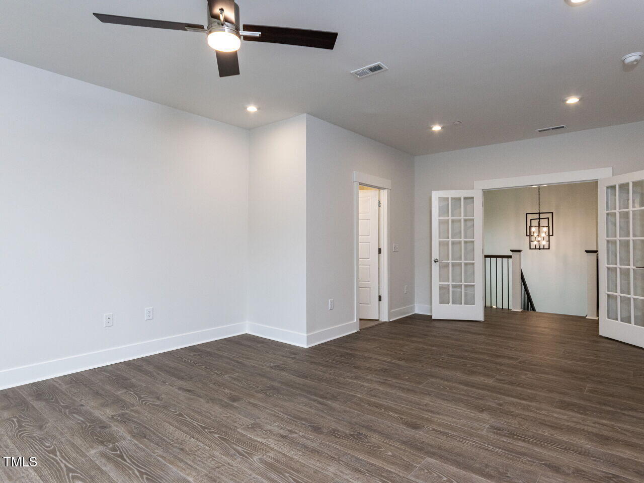 1001 Coldspring Circle Durham, NC 27705 - Photo 39 of 49 a view of empty room with wooden floor