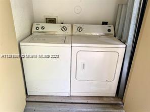 430 South Park Road, Unit 3302 Hollywood, FL 33021 - Photo 11 of 31 a utility room with dryer and washer