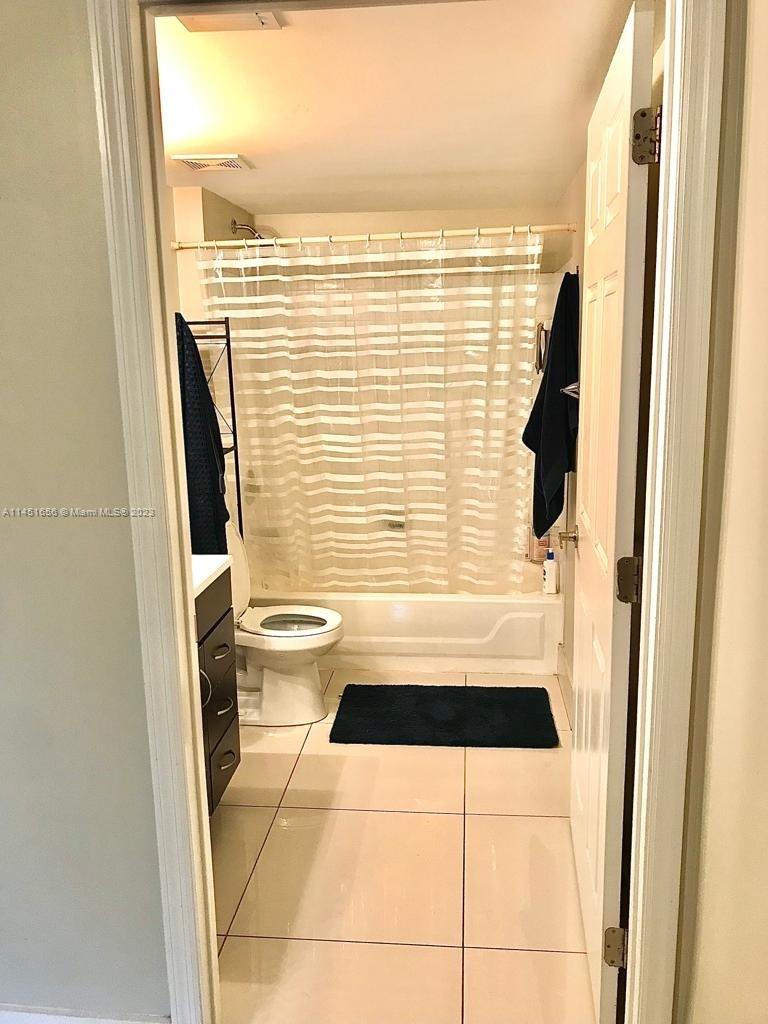 430 South Park Road, Unit 3302 Hollywood, FL 33021 - Photo 17 of 31 a bathroom with a sink toilet and shower