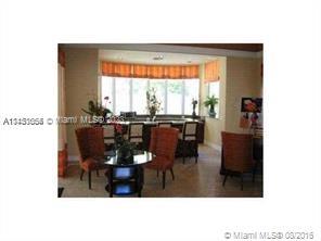 430 South Park Road, Unit 3302 Hollywood, FL 33021 - Photo 24 of 31 a view of a dining room with furniture and window