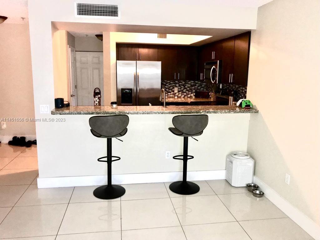 430 South Park Road, Unit 3302 Hollywood, FL 33021 - Photo 5 of 31 a view of living room with furniture and window