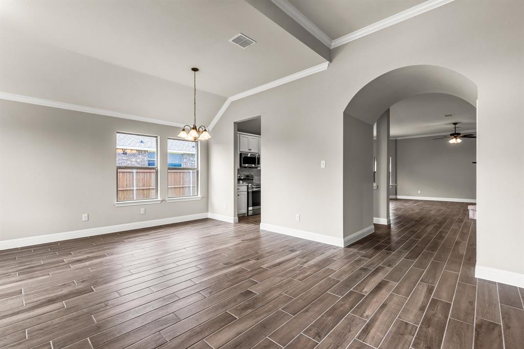 314 Pennington Road Josephine, TX 75173 - Photo 27 of 37 wooden floor in an empty room with a window