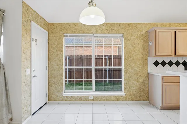 a open kitchen with a refrigerator a stove a sink dishwasher a oven and a cabinets with wooden floor