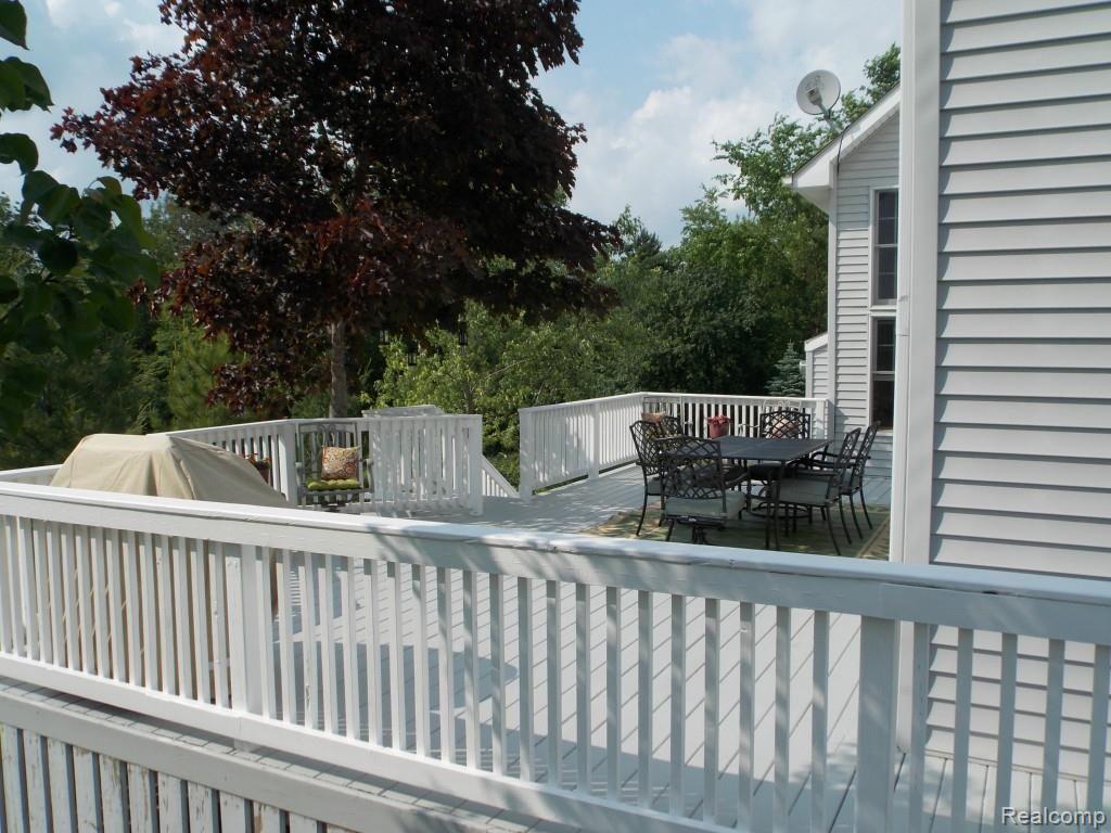 2974 Hannan Road Imlay City, MI 48444 - Photo 6 of 45 The deck has 2 exterior entrances and one from the kitchen/dining area.
