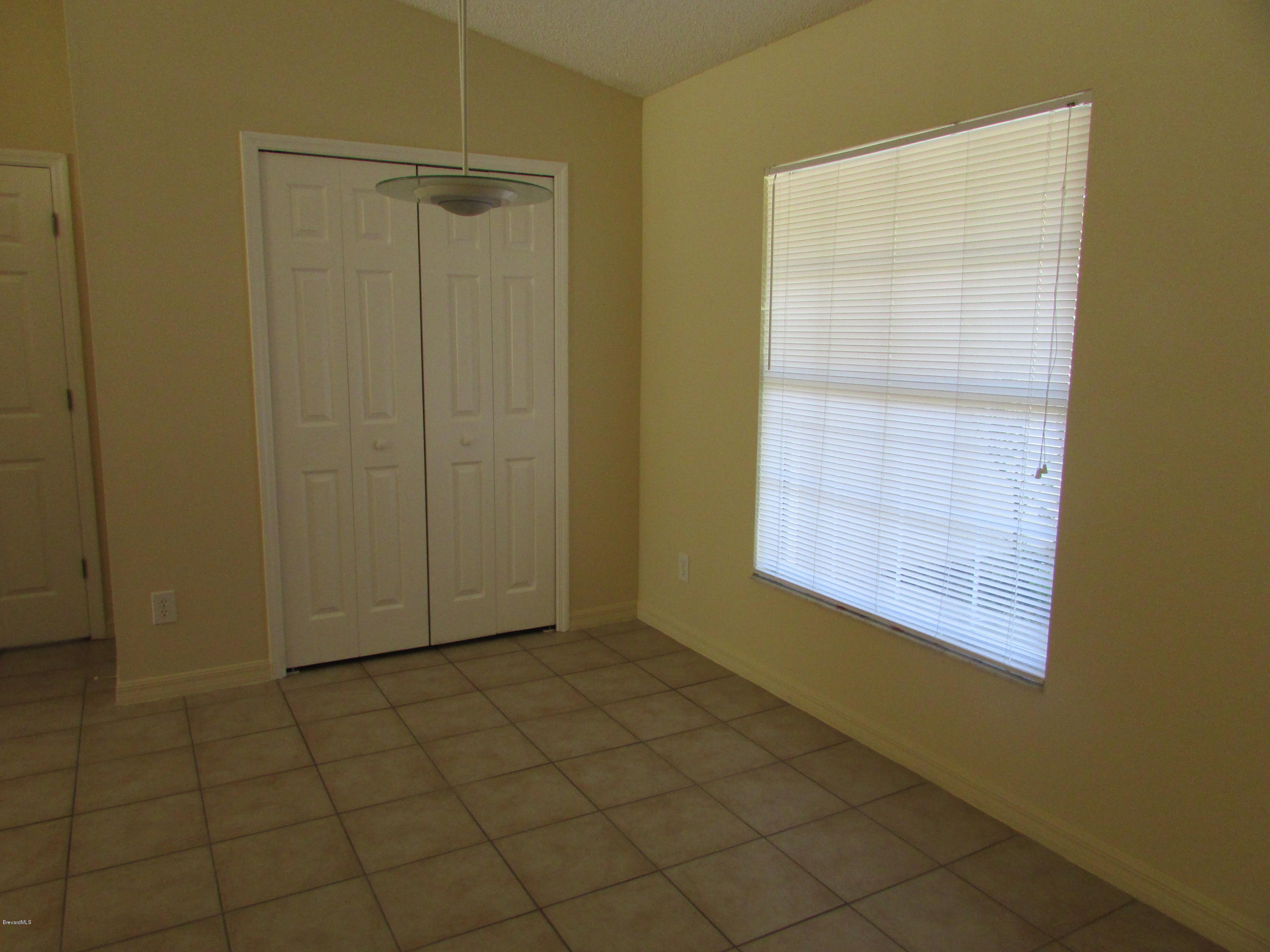 661 Southwest Waycross Road Palm Bay, FL 32908 - Photo 3 of 15 EAT-IN KITCHEN