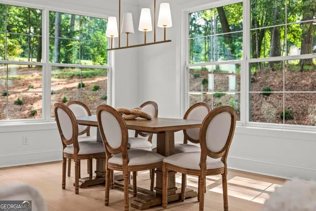 a table and chairs in a balcony