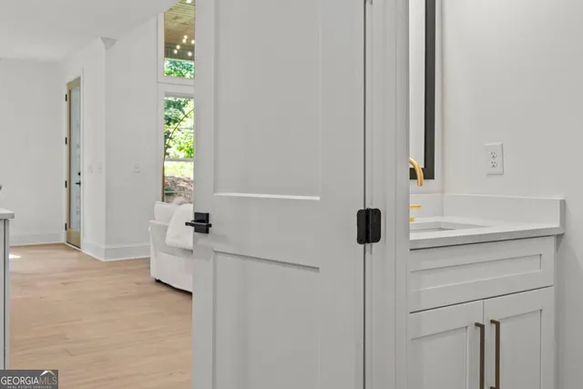 a bathroom with a tub and shower