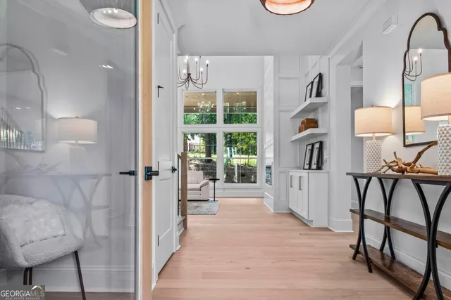 a view of a livingroom with furniture and windows