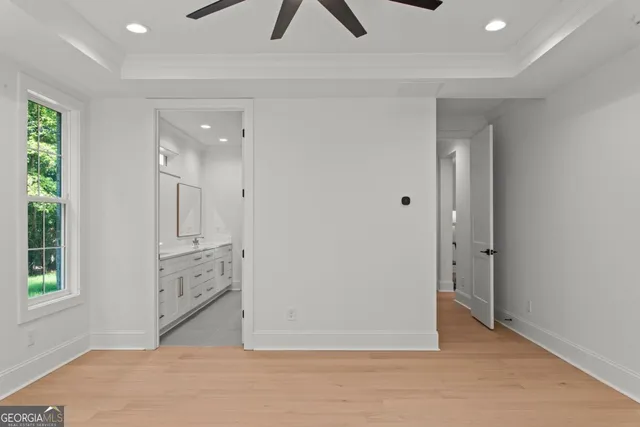 a view of an empty room and window