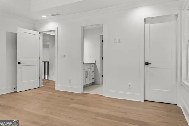 a view of entryway with wooden floor