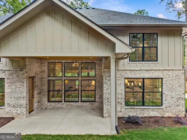 a view of backyard with cabin