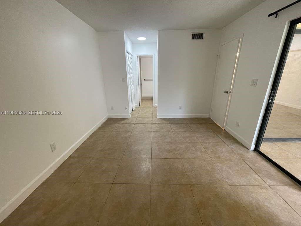 3410 Foxcroft Road, Unit 213 Miramar, FL 33025 - Photo 11 of 20 Master Bedroom