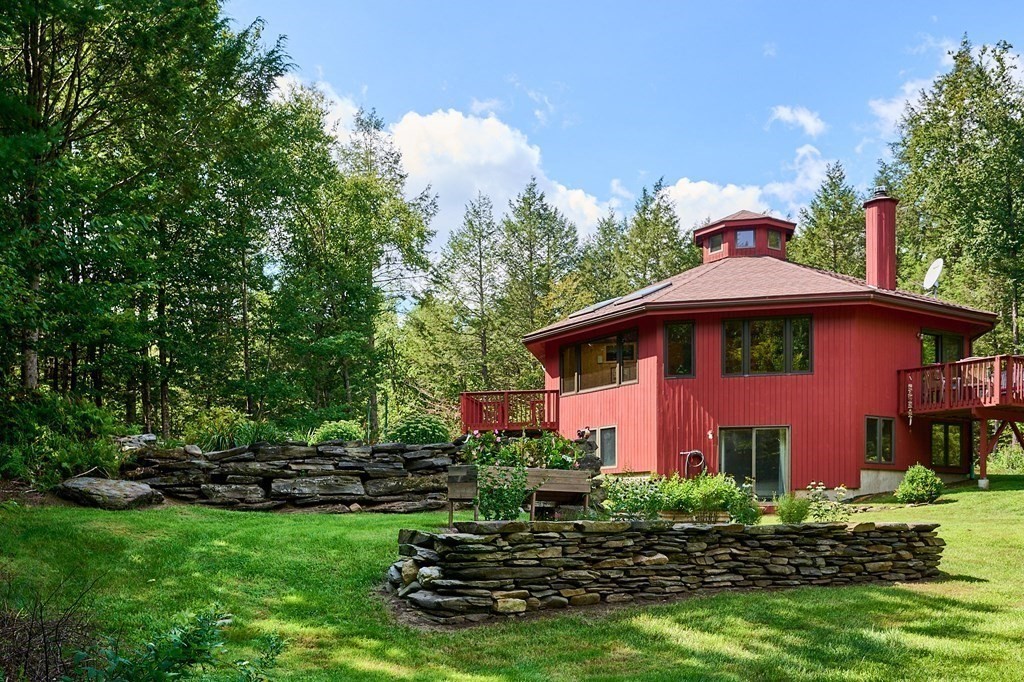 90 Patterson Road Worthington, MA 01098 - Photo 1 of 30 a front view of a house with a yard