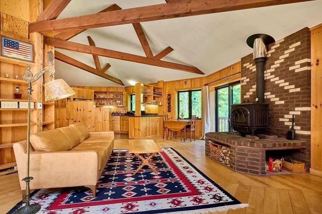90 Patterson Road Worthington, MA 01098 - Photo 13 of 30 a living room with furniture a rug and a fireplace