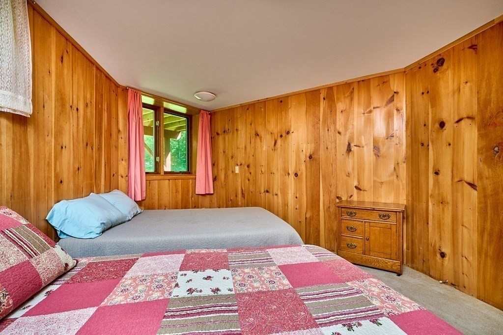 90 Patterson Road Worthington, MA 01098 - Photo 21 of 30 a bedroom with a bed and wooden floor