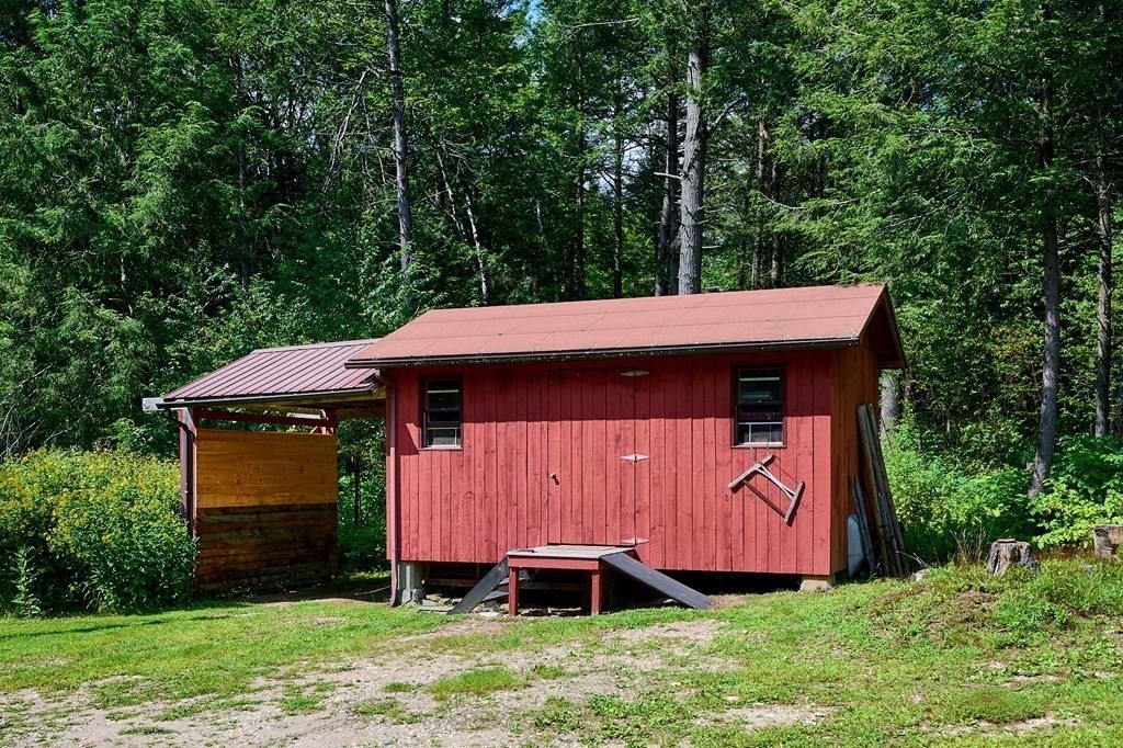 90 Patterson Road Worthington, MA 01098 - Photo 26 of 30 a view of a small barn with a small yard