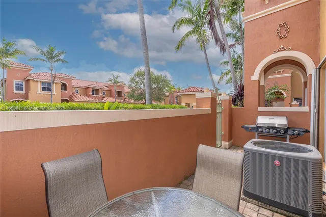 a view of furniture and window in an outdoor space