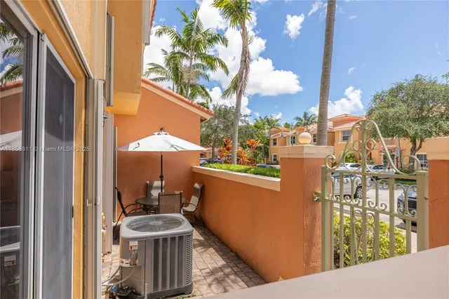 a view of a pathway with a yard