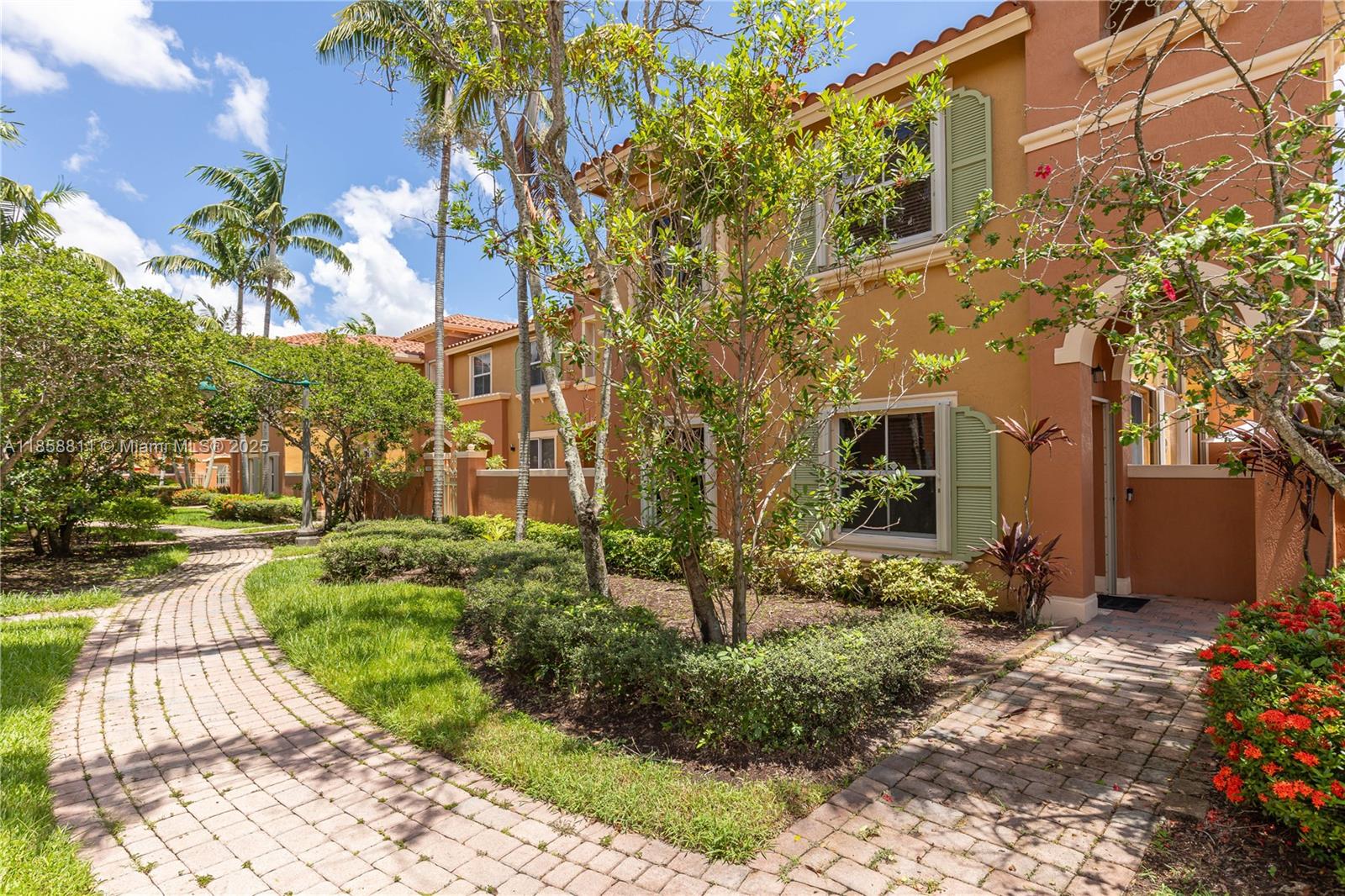1068 Southwest 143rd Avenue, Unit 2510 Pembroke Pines, FL 33027 - Photo 39 of 49 a view of a pathway with a yard