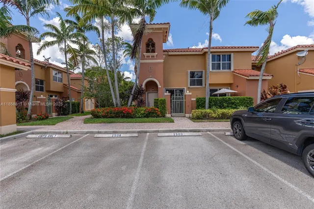 a front view of a multi story residential apartment building