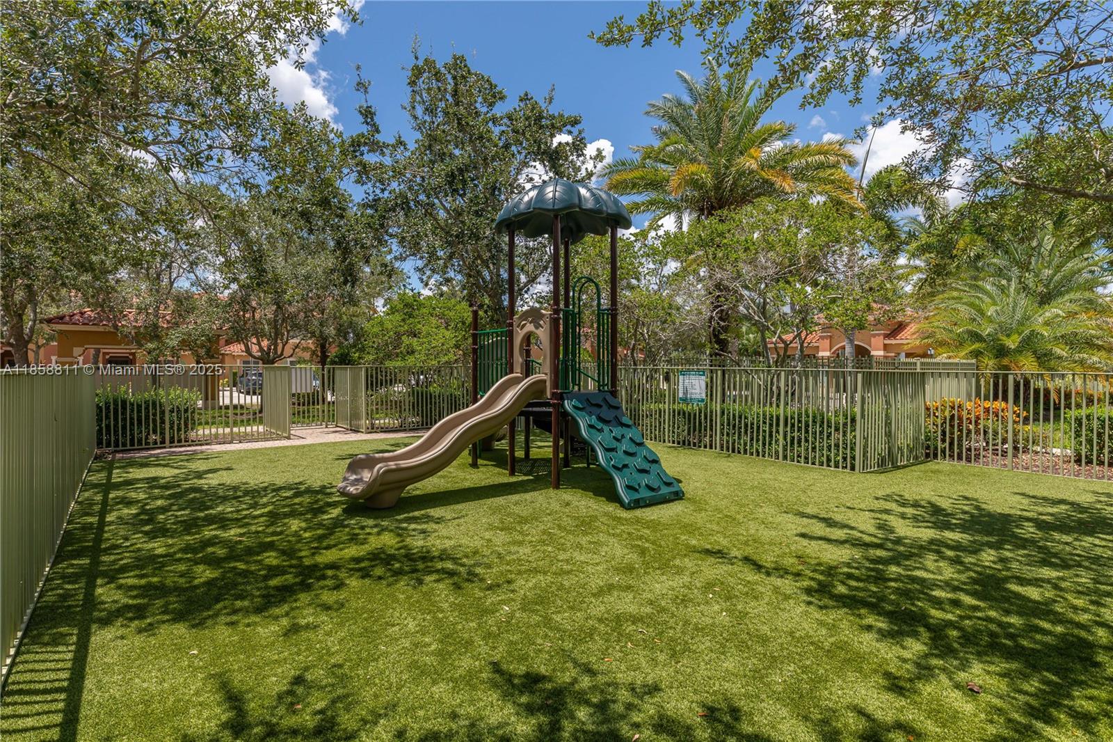 1068 Southwest 143rd Avenue, Unit 2510 Pembroke Pines, FL 33027 - Photo 43 of 49 a view of a lake with a park