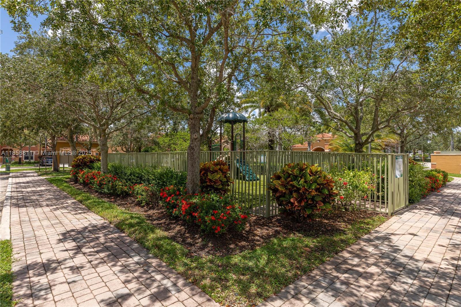 1068 Southwest 143rd Avenue, Unit 2510 Pembroke Pines, FL 33027 - Photo 44 of 49 a view of a garden
