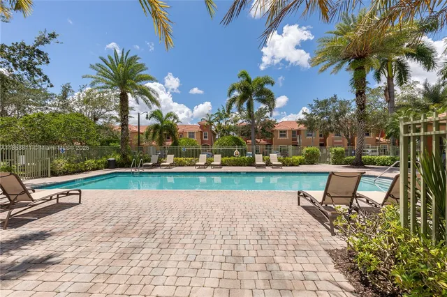 a view of a park with a tree