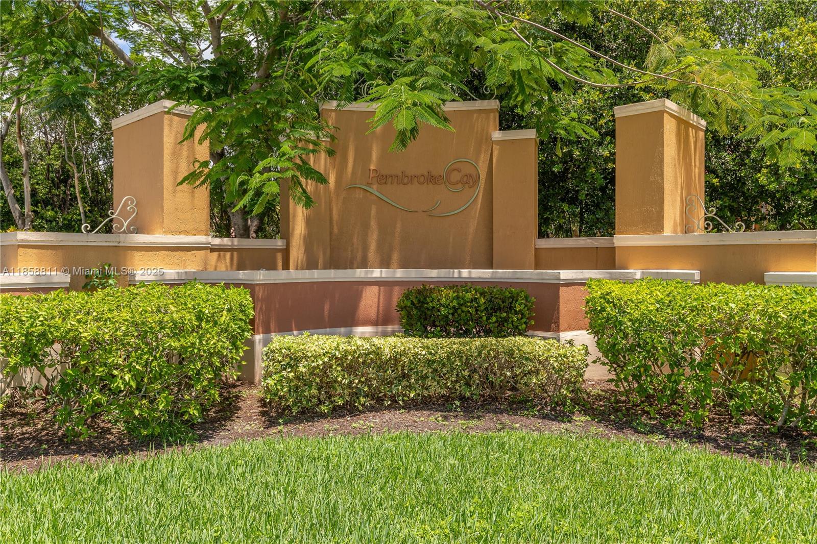 1068 Southwest 143rd Avenue, Unit 2510 Pembroke Pines, FL 33027 - Photo 48 of 49 a view of a back yard