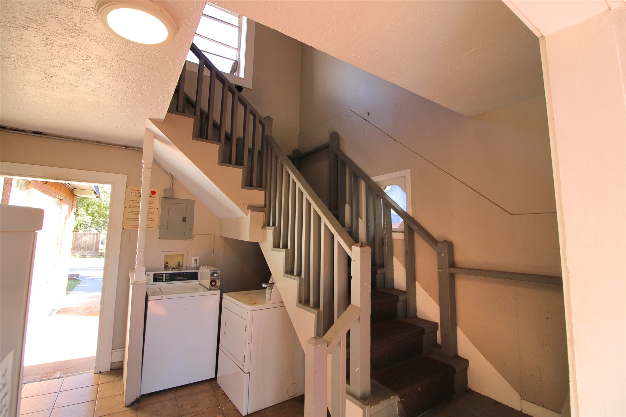 1305 Adams Street, Unit 1 Conroe, TX 77301 - Photo 12 of 14 a view of entryway and hall with wooden floor